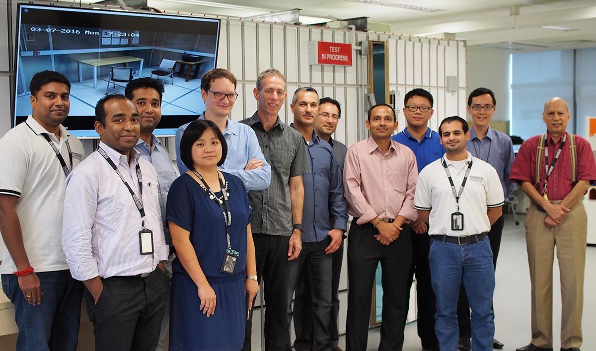 The iTrust research team in front of the IoT security testbed